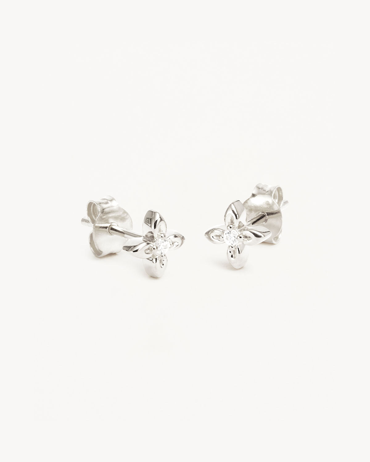 Silver flower stud deals earrings