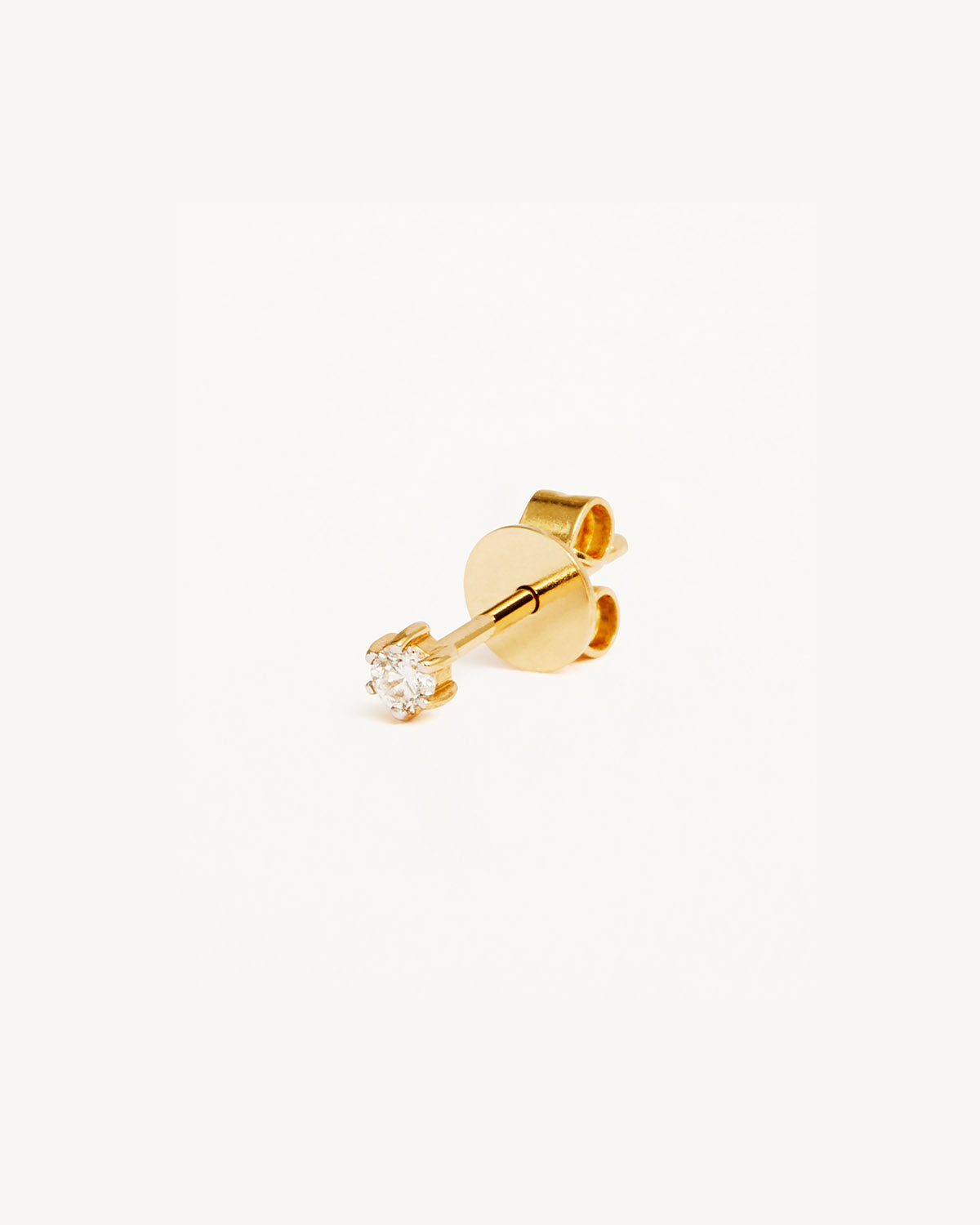 Single stone online stud earrings gold