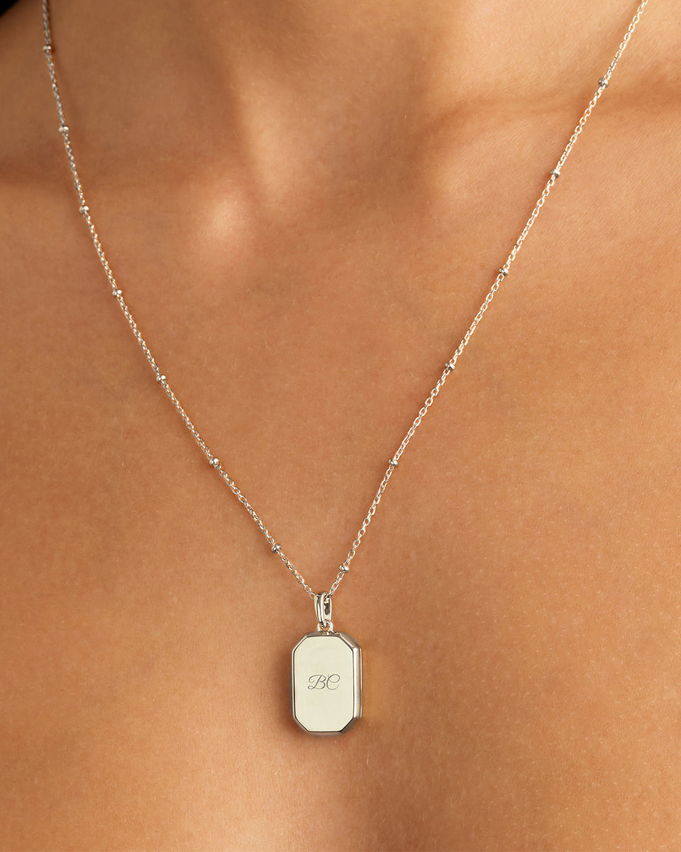 Sterling Silver Rectangular Lotus Locket Pendant – by charlotte